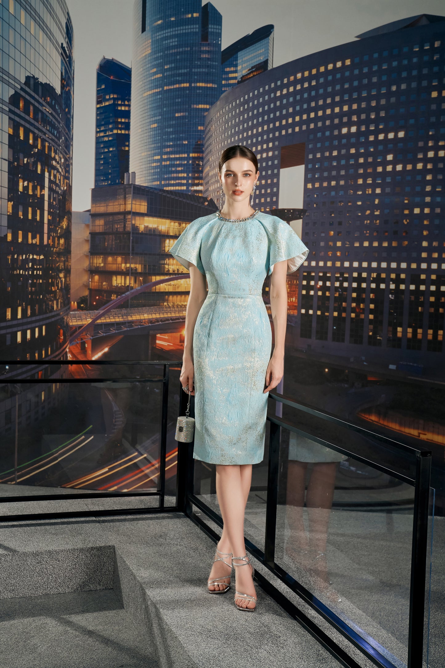 Light Blue Sheath Dress with Metallic Finish and Cape Sleeves