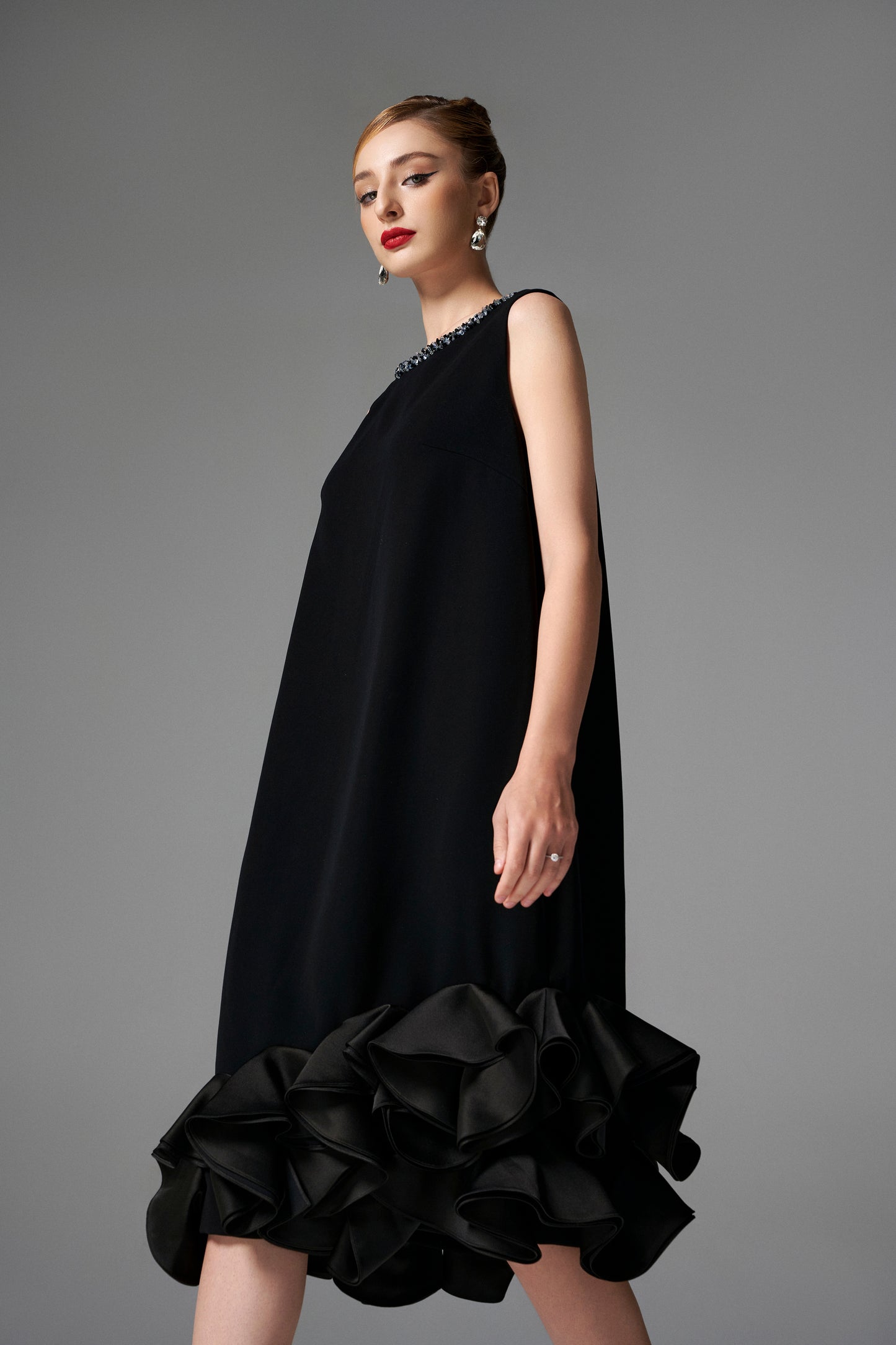 Sleeveless Black Midi Dress with Embellished Neckline and Ruffled Hem