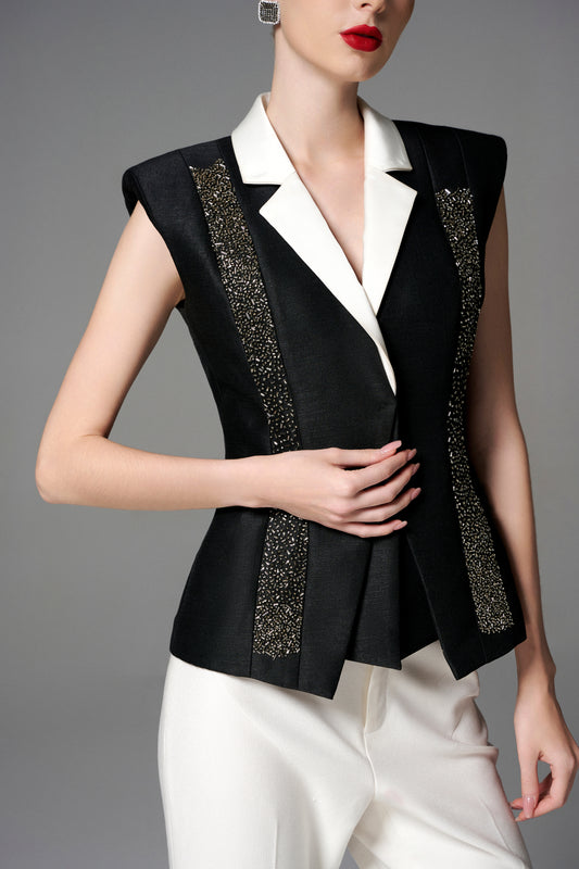 Black and White Sleeveless Blazer with Embellished Accents and Wide-Leg Trousers