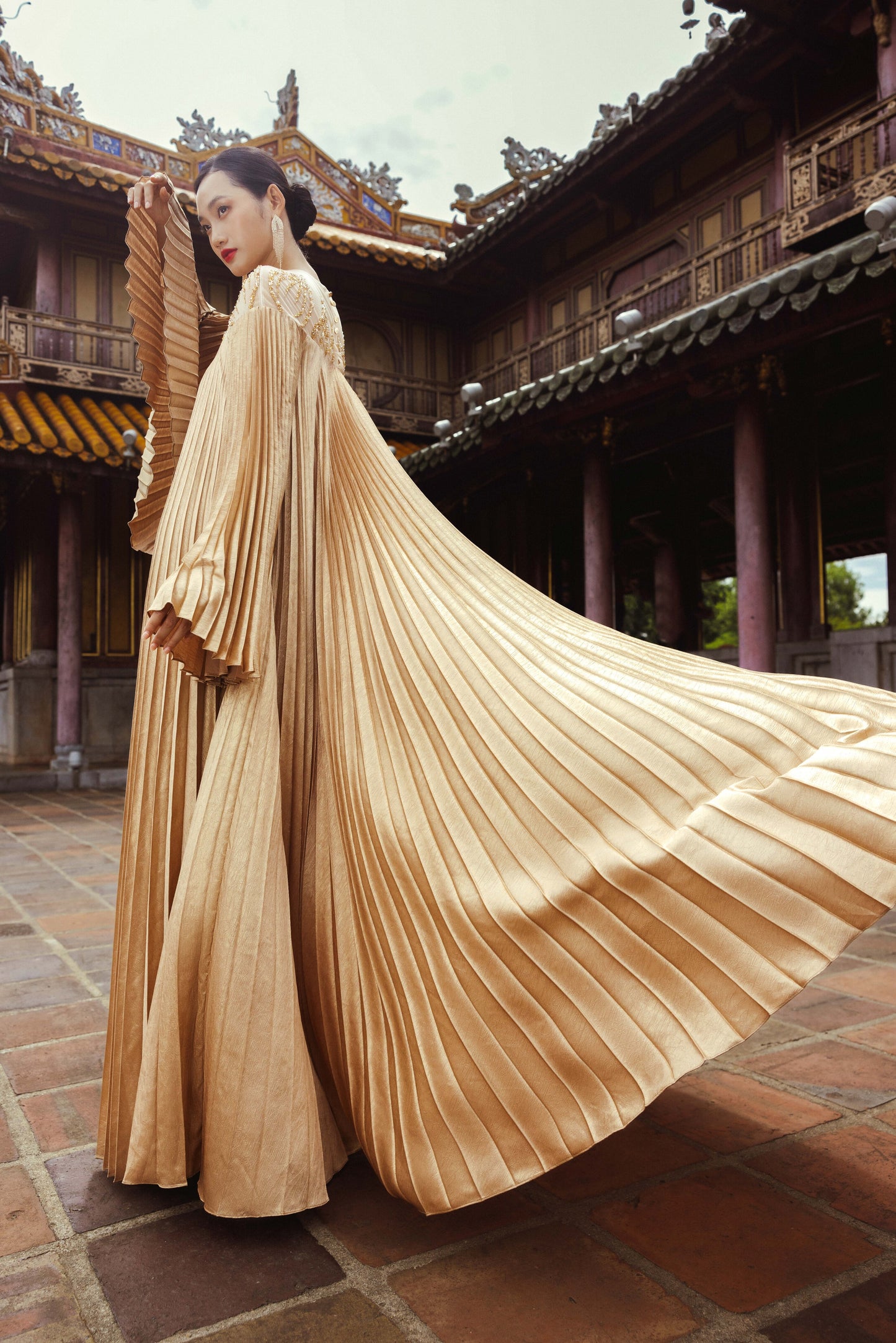 Golden Pleated Maxi Gown with Flowing Bell Sleeves