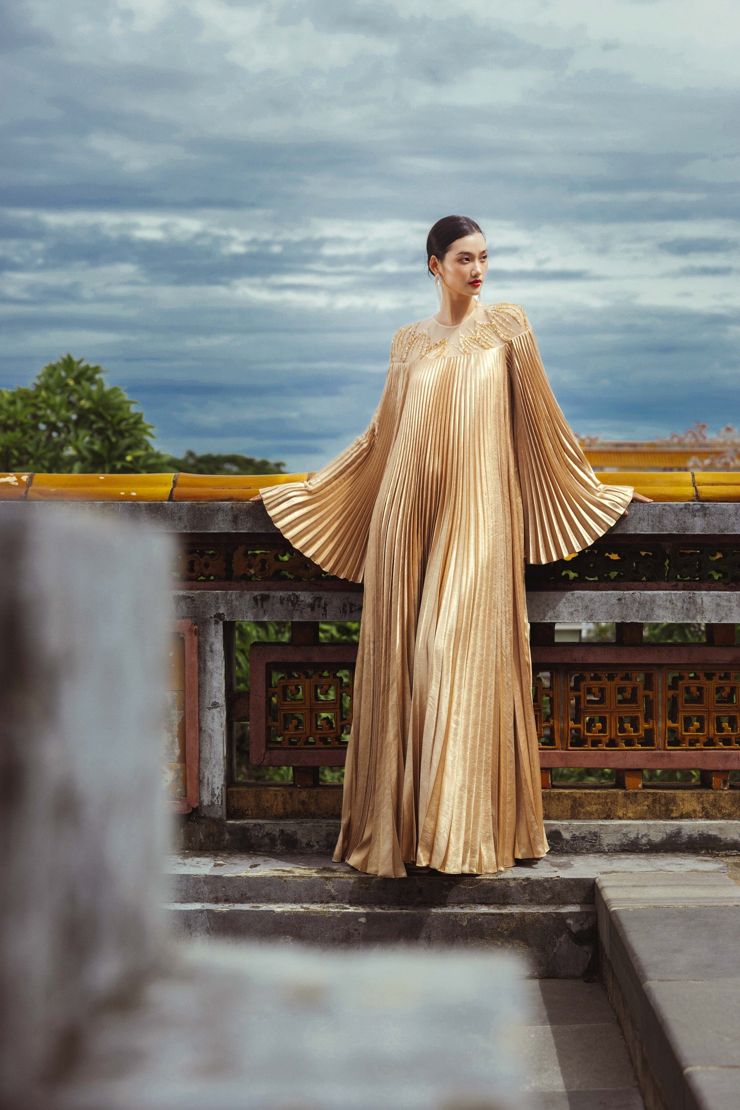 Golden Pleated Maxi Gown with Flowing Bell Sleeves