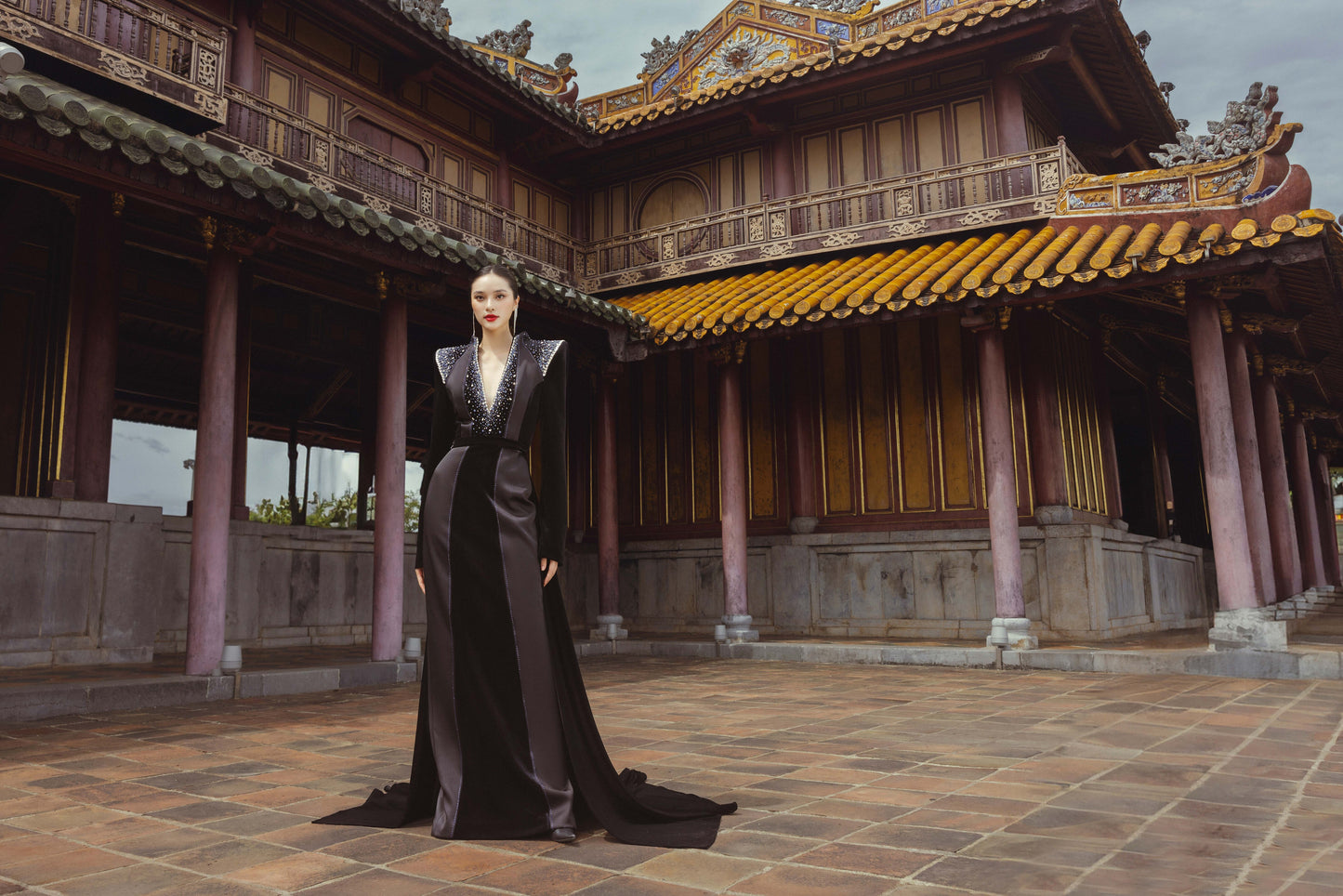 Black Velvet Evening Gown with Beaded Detailing and Structured Shoulders