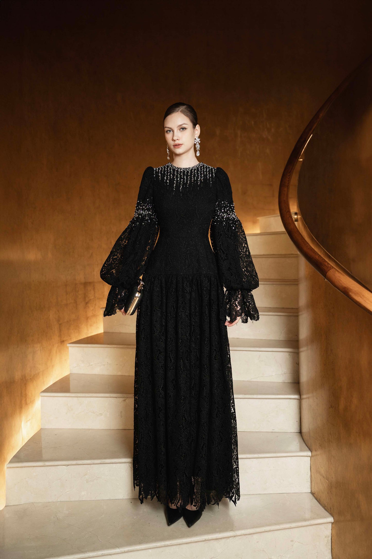 Black Lace Gown with Beaded Embellishments and Dramatic Sleeves