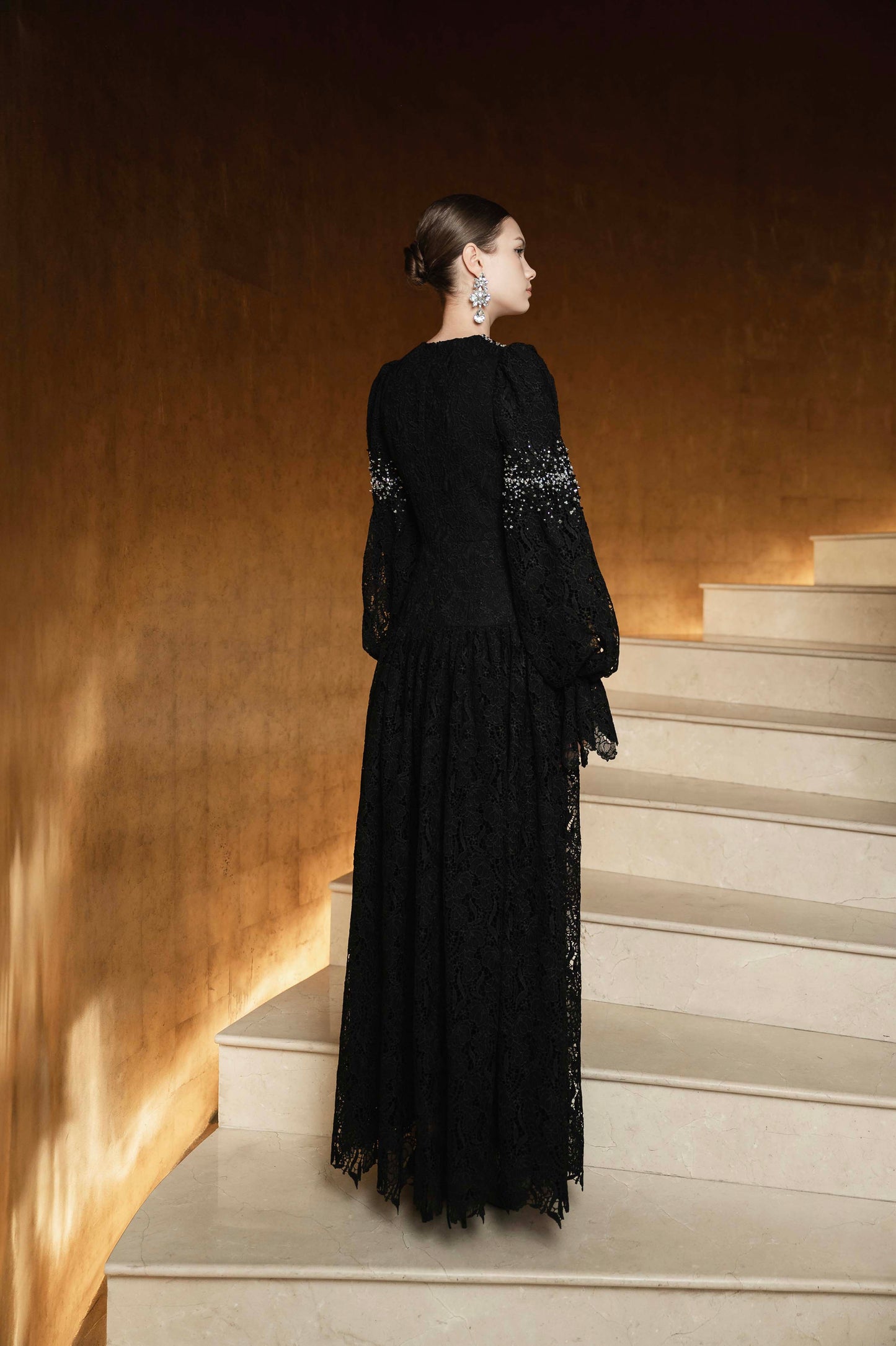 Black Lace Gown with Beaded Embellishments and Dramatic Sleeves