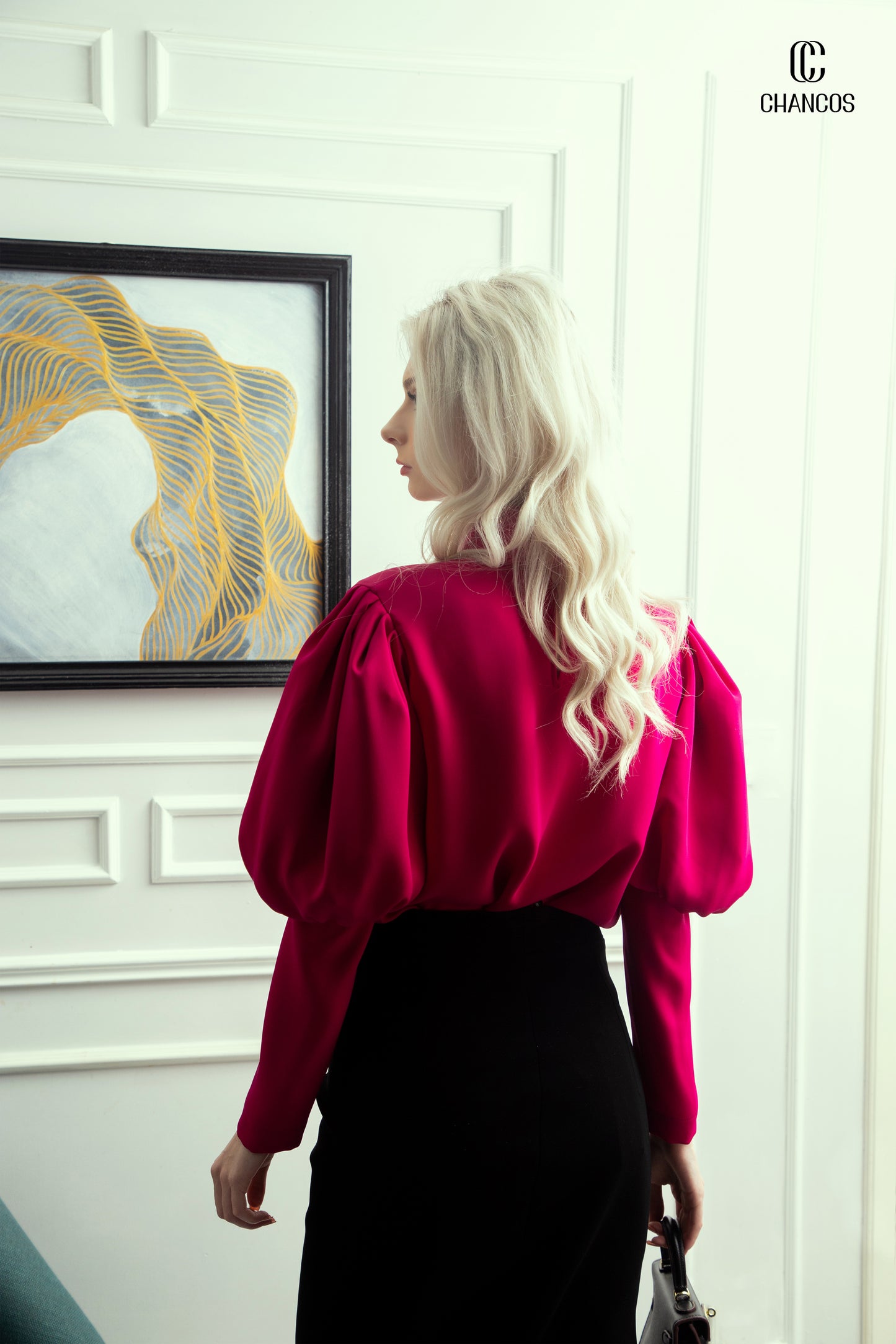 High-Neck Fuchsia Blouse with Puff Sleeves and Black Pencil Skirt