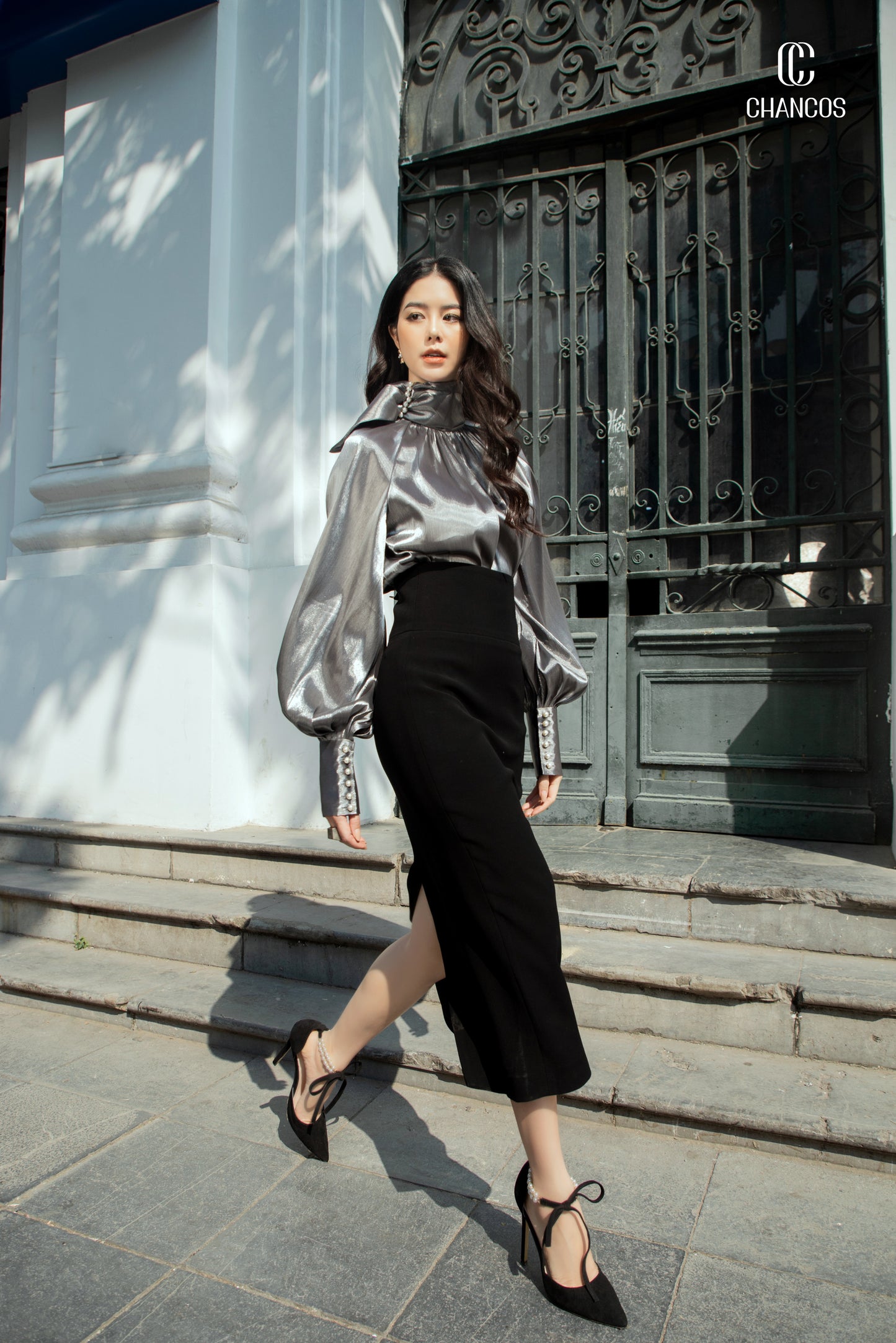 Metallic Silver High-Neck Blouse with Puff Sleeves and Button Cuffs