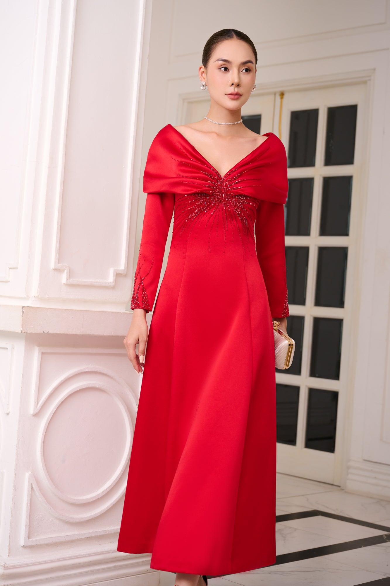 Red Satin Evening Gown with Embellished V-Neck and Long Sleeves