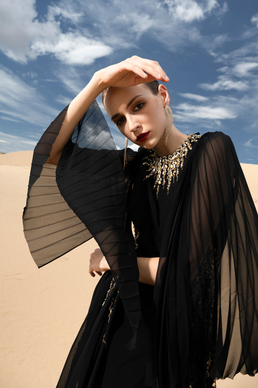 Black Flowing Chiffon Gown with Flared Sleeves and Gold Embellishments