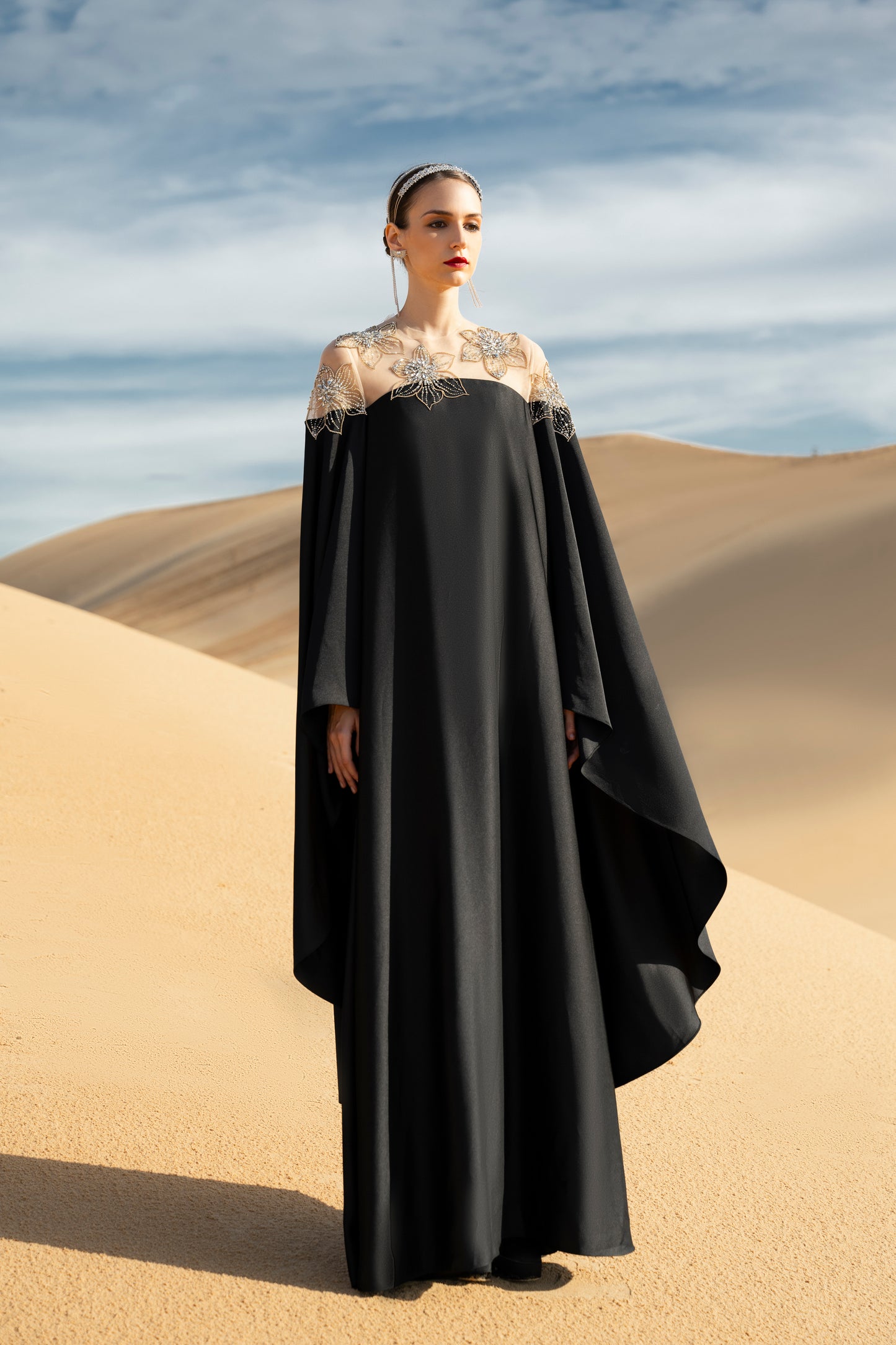 Black Draped Gown with Sheer Embroidered Bodice and Cape Sleeves