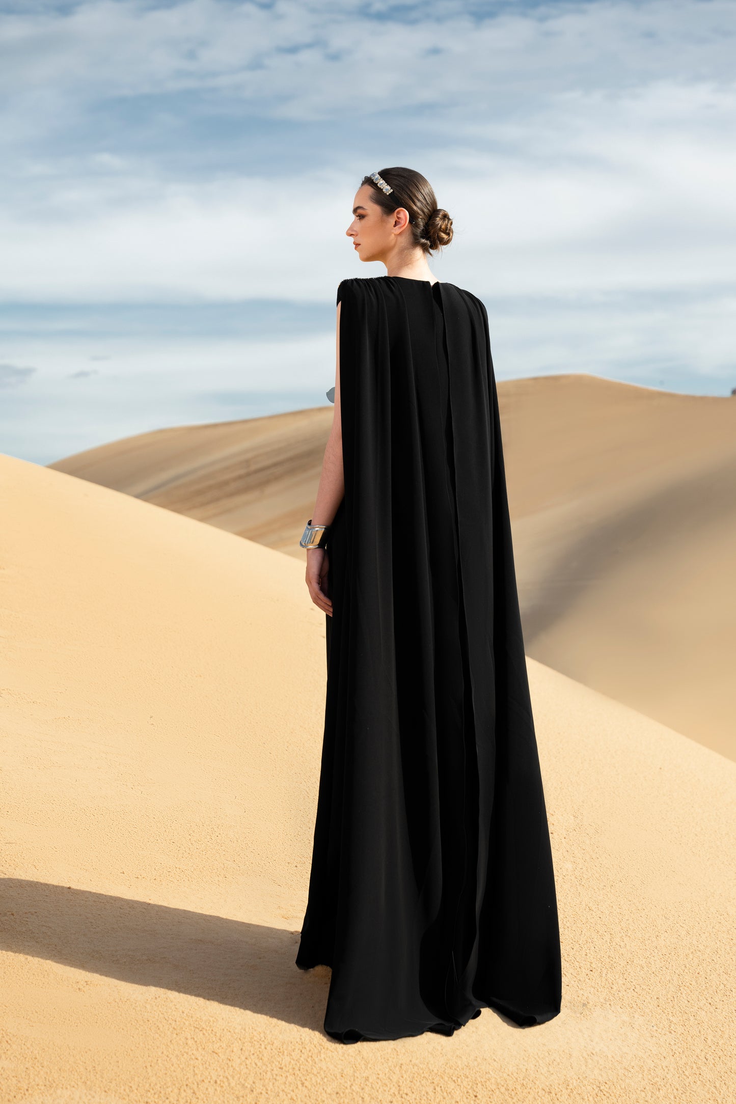 Black Cape Gown with Gold Floral Embroidery and Jewel Accents