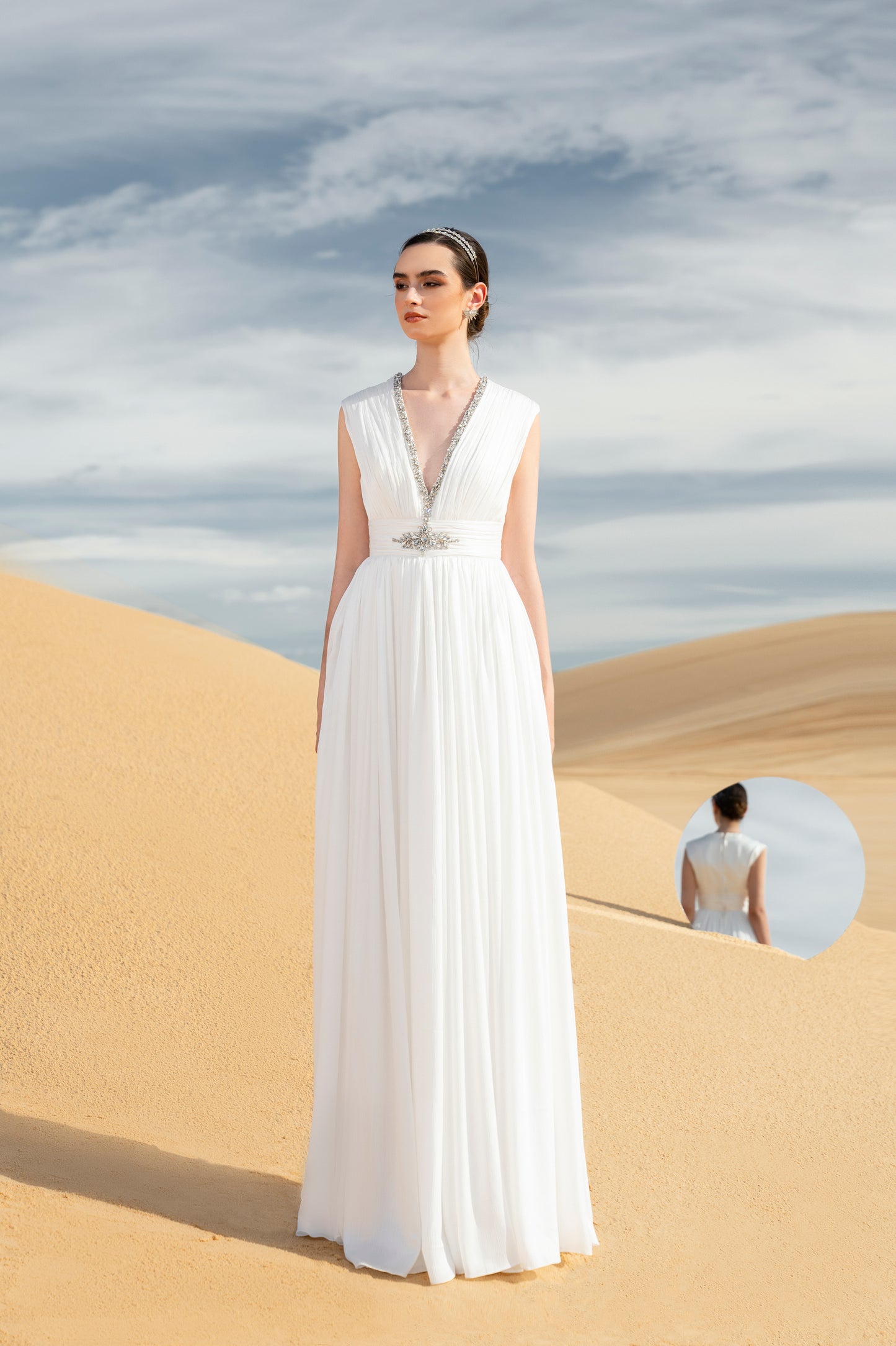 White Gown with Beaded Cape and Plunging Neckline