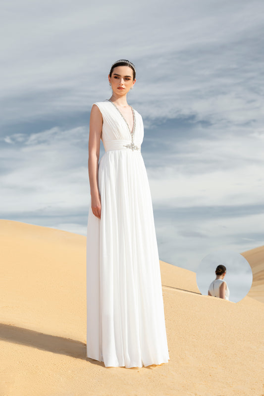 White Gown with Beaded Cape and Plunging Neckline