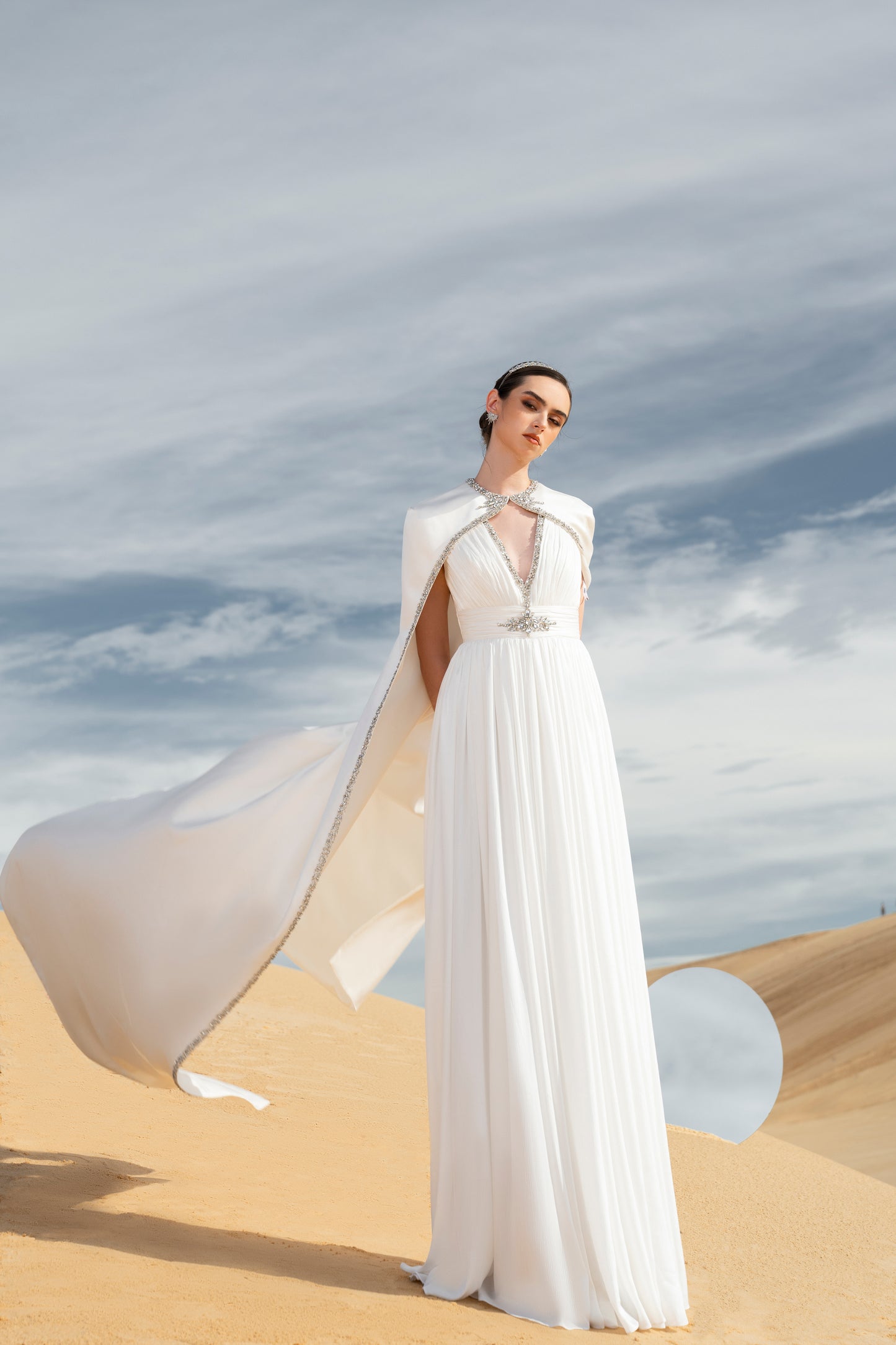 White Gown with Beaded Cape and Plunging Neckline