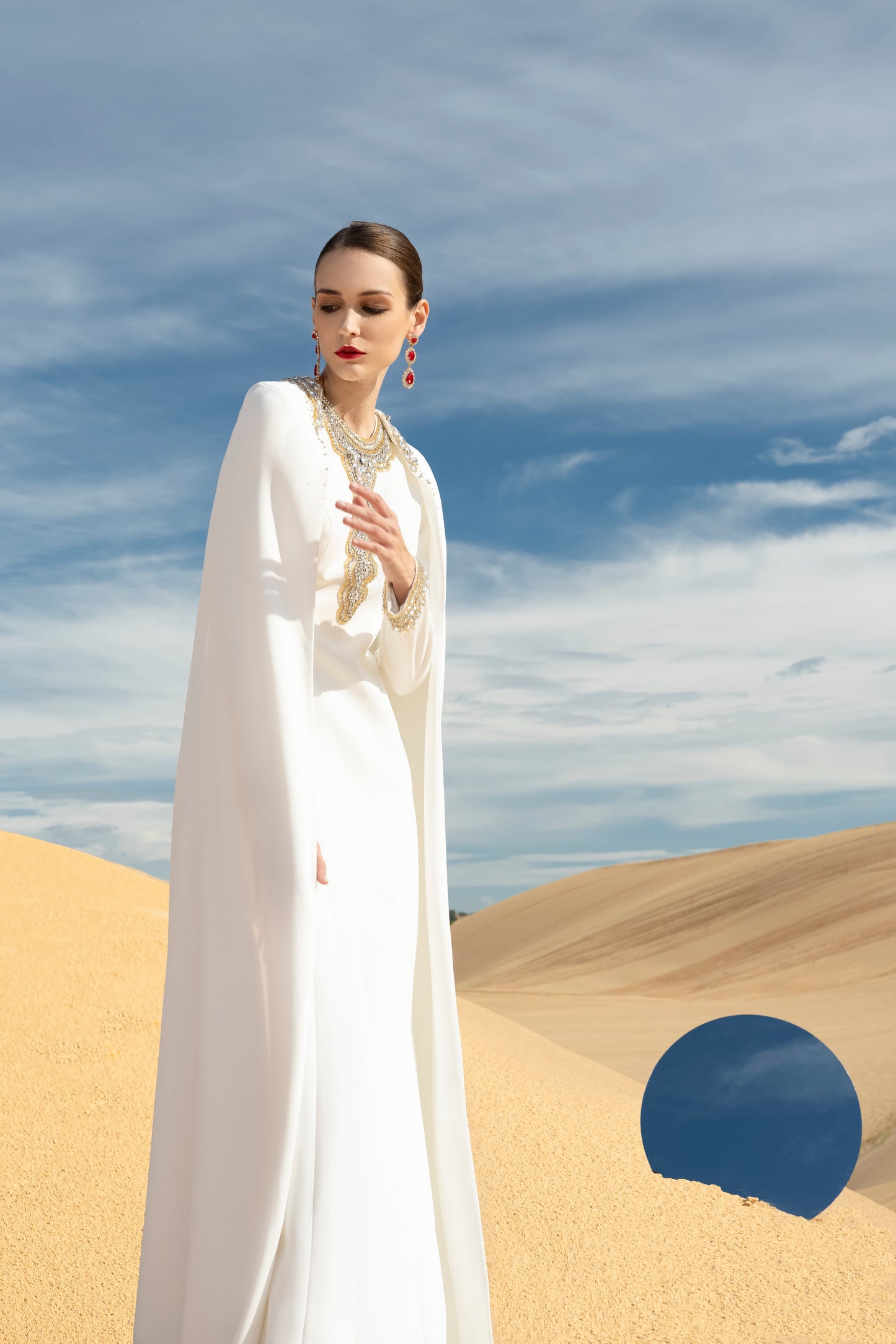 White Gown with Golden Embroidery and Cape