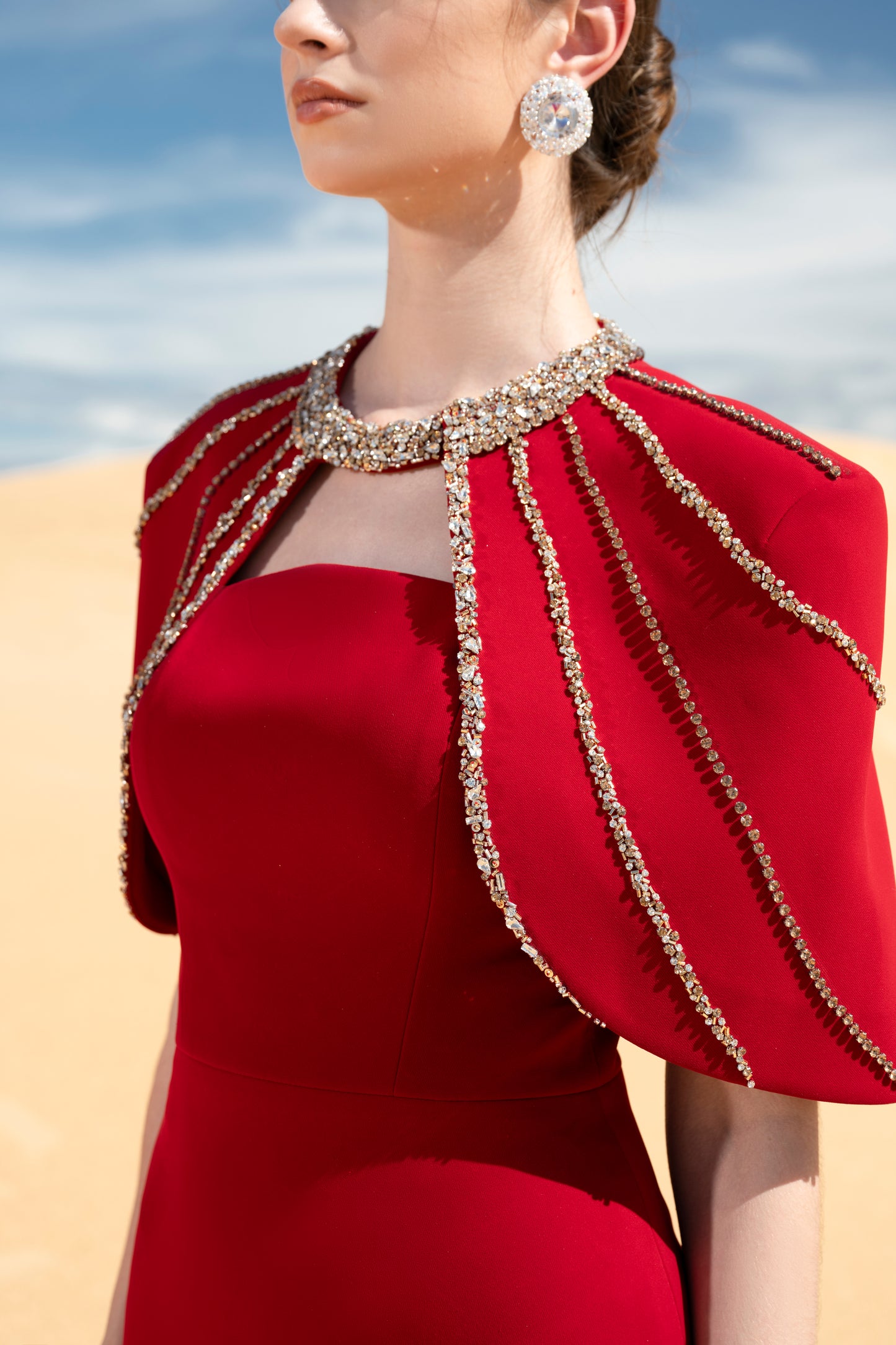 Red Evening Gown with Beaded Capelet and Strapless Design