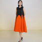 Sleeveless Black and Orange A-Line Midi Dress with Colorblock Design