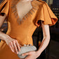 Orange V-Neck Pencil Dress with Flutter Sleeves and Embellished Neckline
