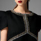 Black Structured A-Line Dress with Crystal Embellishments and Angular Sleeves