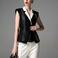 Black and White Sleeveless Blazer with Embellished Accents and Wide-Leg Trousers