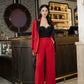 Chic Red Wide-Leg Pantsuit with Embellished Blazer and Black Bustier Top