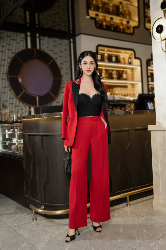 Chic Red Wide-Leg Pantsuit with Embellished Blazer and Black Bustier Top