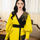 Bold Yellow Midi Wrap Dress with Black Embellished Detailing