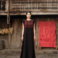 Black Gabardine Maxi Dress with Embroidered Bodice and Side Panels