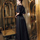 Black Evening Gown with Flared Sleeves and Embellished Buttons