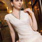 White Embellished V-Neck Midi Dress for Formal Occasions