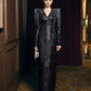 Black Embellished Long-Sleeve Evening Gown with Structured Shoulders