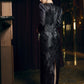 Black Embellished Long-Sleeve Evening Gown with Structured Shoulders