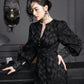Black Midi Dress with Textured Fabric and Statement Cuffs