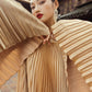 Golden Pleated Maxi Gown with Flowing Bell Sleeves