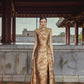 Gold Brocade Evening Gown with Embellished Shoulders