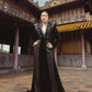 Black Velvet Evening Gown with Beaded Detailing and Structured Shoulders