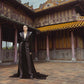 Black Velvet Evening Gown with Beaded Detailing and Structured Shoulders