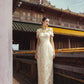 Gold Brocade Embroidered Long Gown with Structured Cape