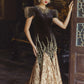 Black and Gold Velvet Gown with Embellished Sleeves and Dramatic Train