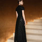 Black Sequin Gown with Capelet