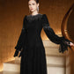 Black Lace Gown with Beaded Embellishments and Dramatic Sleeves
