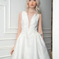 Ivory A-Line Dress with Floral Appliqué and Deep V-Neck
