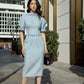 Elegant Light Blue Midi Dress with Puff Sleeves and Belted Waist