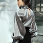 Metallic Silver High-Neck Blouse with Puff Sleeves and Button Cuffs