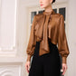 Satin Bronze High-Neck Blouse with Draped Front and Black Wide-Leg Pants