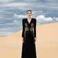 Black Long-Sleeve Gown with Gold Embellished Floral Design and V-Neckline