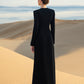 Black Floral Embellished Gown with Gold Detailing and Long Sleeves