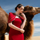 Red Evening Gown with Beaded Capelet and Strapless Design
